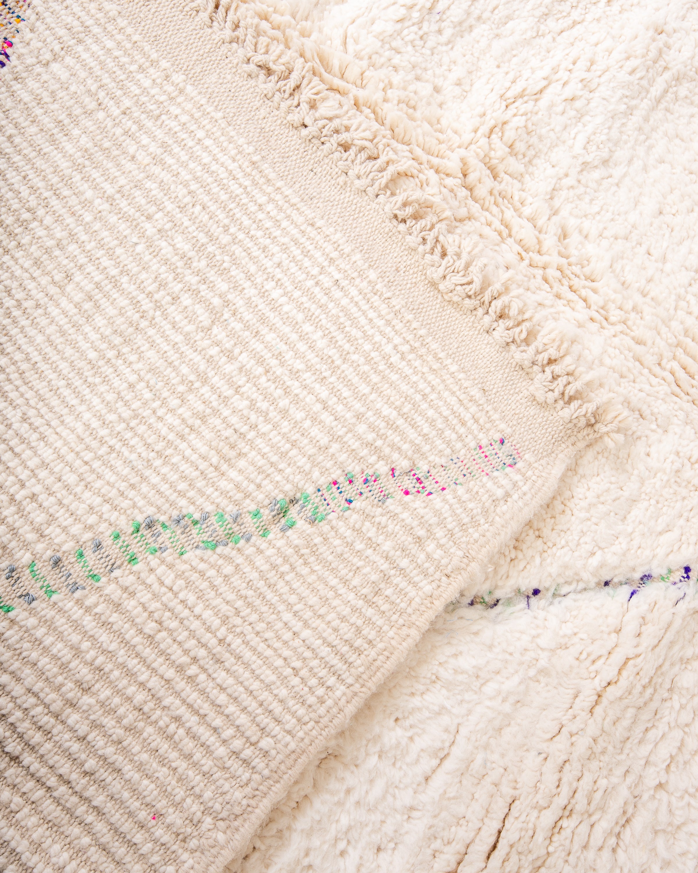 Modern designer handcrafted Berber rug from morocco Beniourain with beautiful colors and patterns and fluffy wool texture