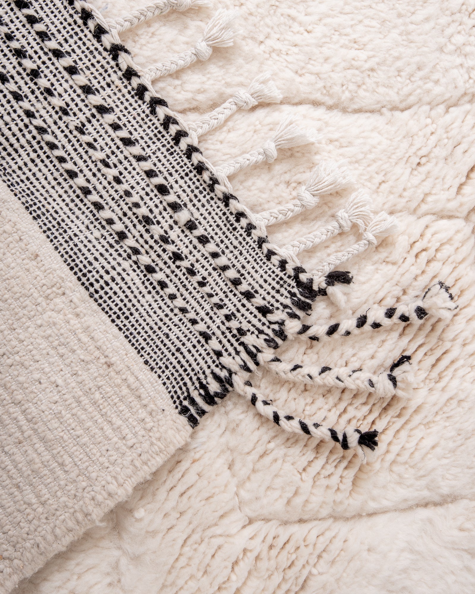 Modern, designer, handcrafted Berber rug from Morocco. Beniourain carpet with beautiful colours and patterns and fluffy wool texture.