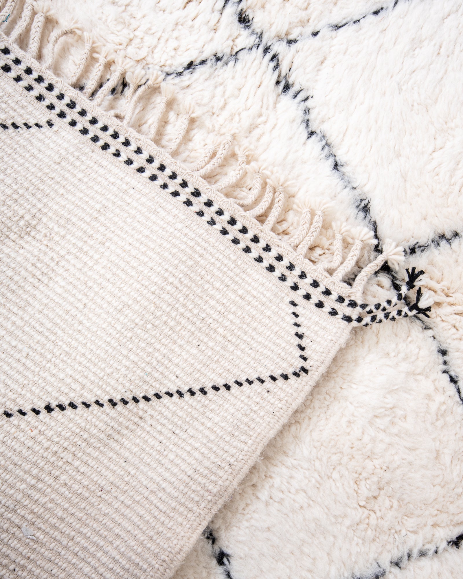 Modern, designer, handcrafted Berber rug from Morocco. Beniourain carpet with beautiful colours and patterns and fluffy wool texture.