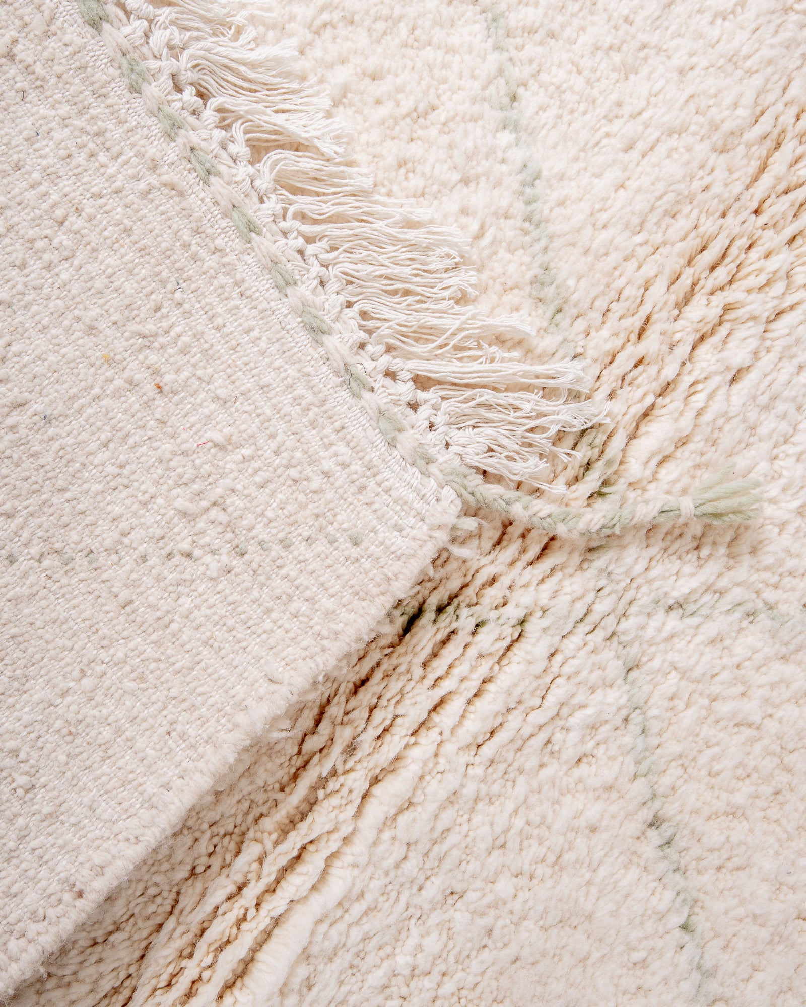 Modern, designer, handcrafted Berber rug from Morocco. Beniourain carpet with beautiful colours and patterns and fluffy wool texture. 