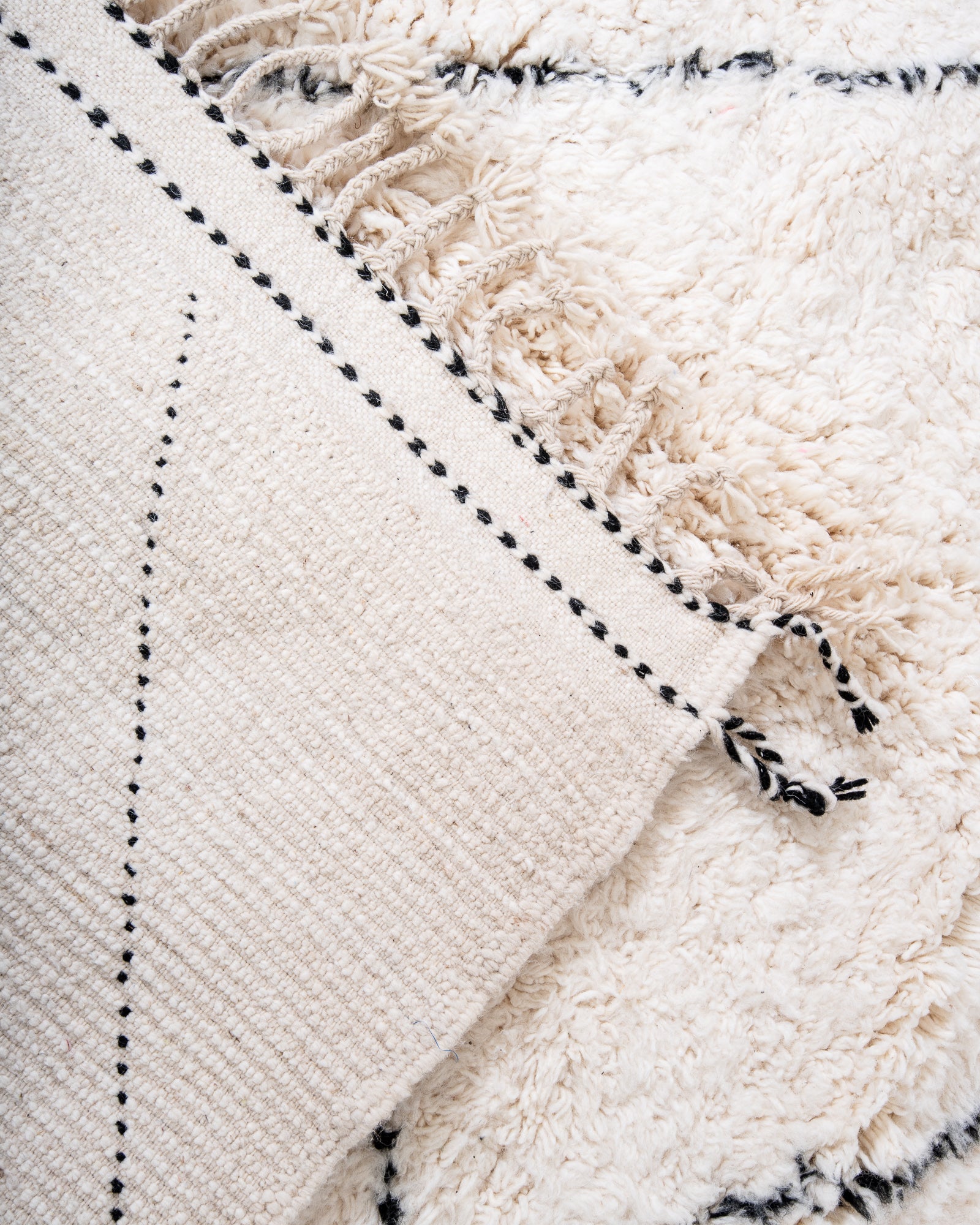 Modern, designer, handcrafted Berber rug from Morocco. Beniourain carpet with beautiful colours and patterns and fluffy wool texture.