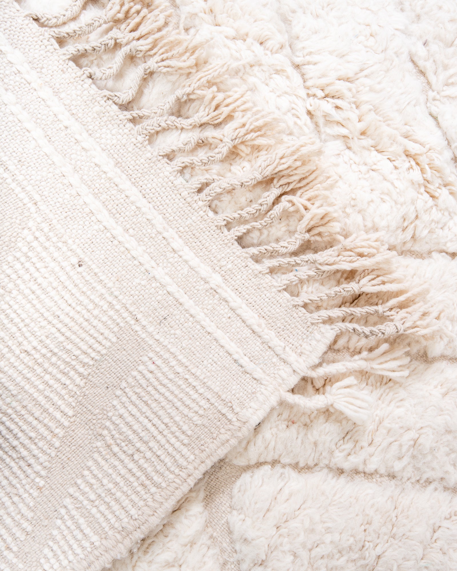 Modern, designer, handcrafted Berber rug from Morocco. Beniourain carpet with beautiful colours and patterns and fluffy wool texture. 