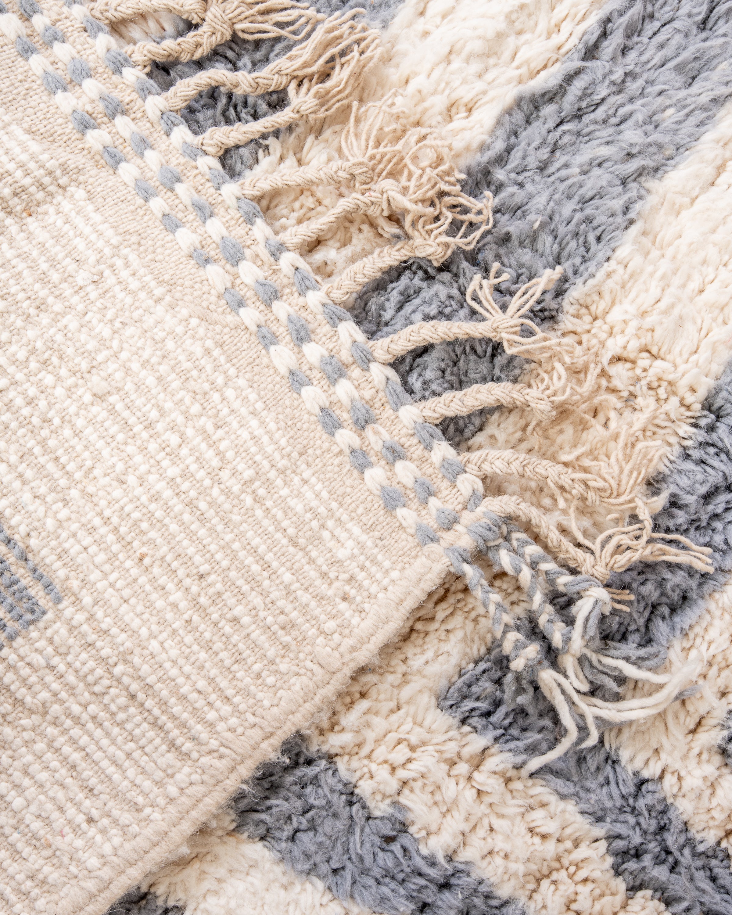 Modern, designer, handcrafted Berber rug from Morocco. Beniourain carpet with beautiful colors and patterns and fluffy wool texture.