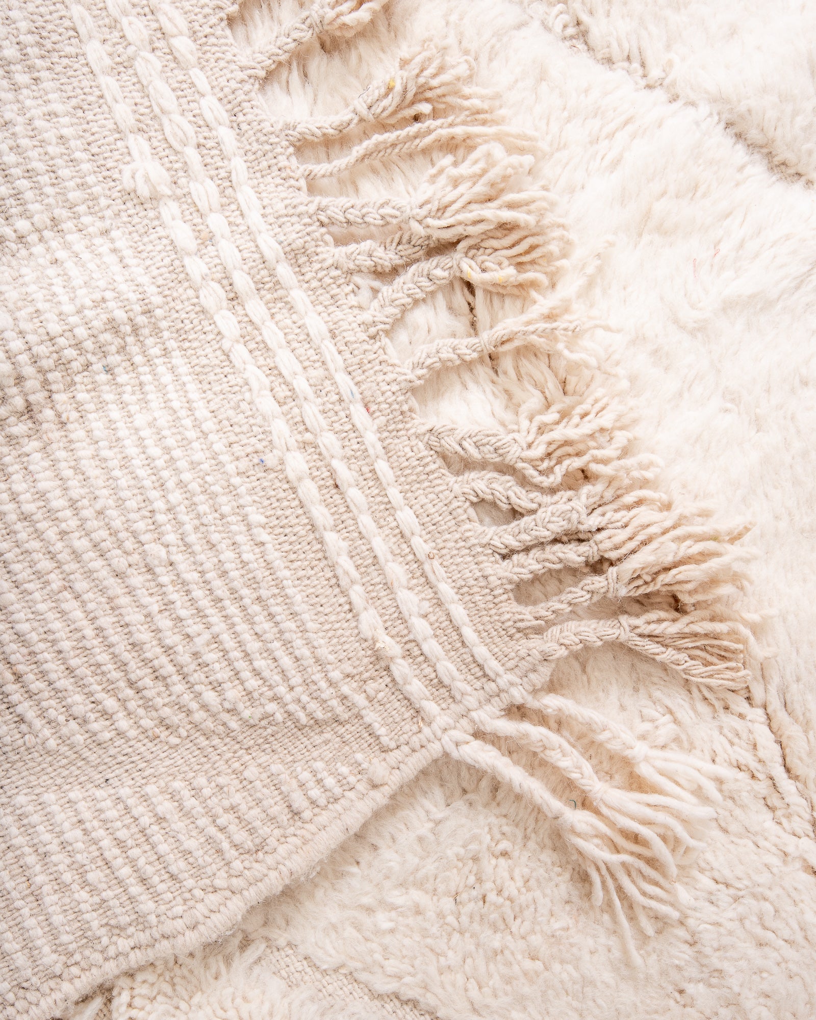 Modern, designer, handcrafted Berber rug from Morocco. Beniourain carpet with beautiful colours and patterns and fluffy wool texture. 