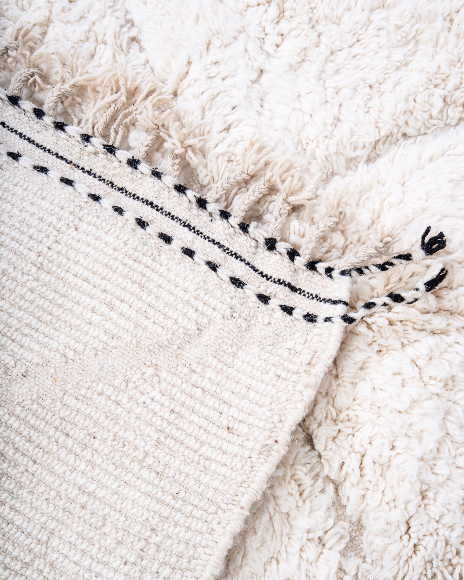 Modern, designer, handcrafted Berber rug from Morocco. Beniourain carpet with beautiful colours and patterns and fluffy wool texture.