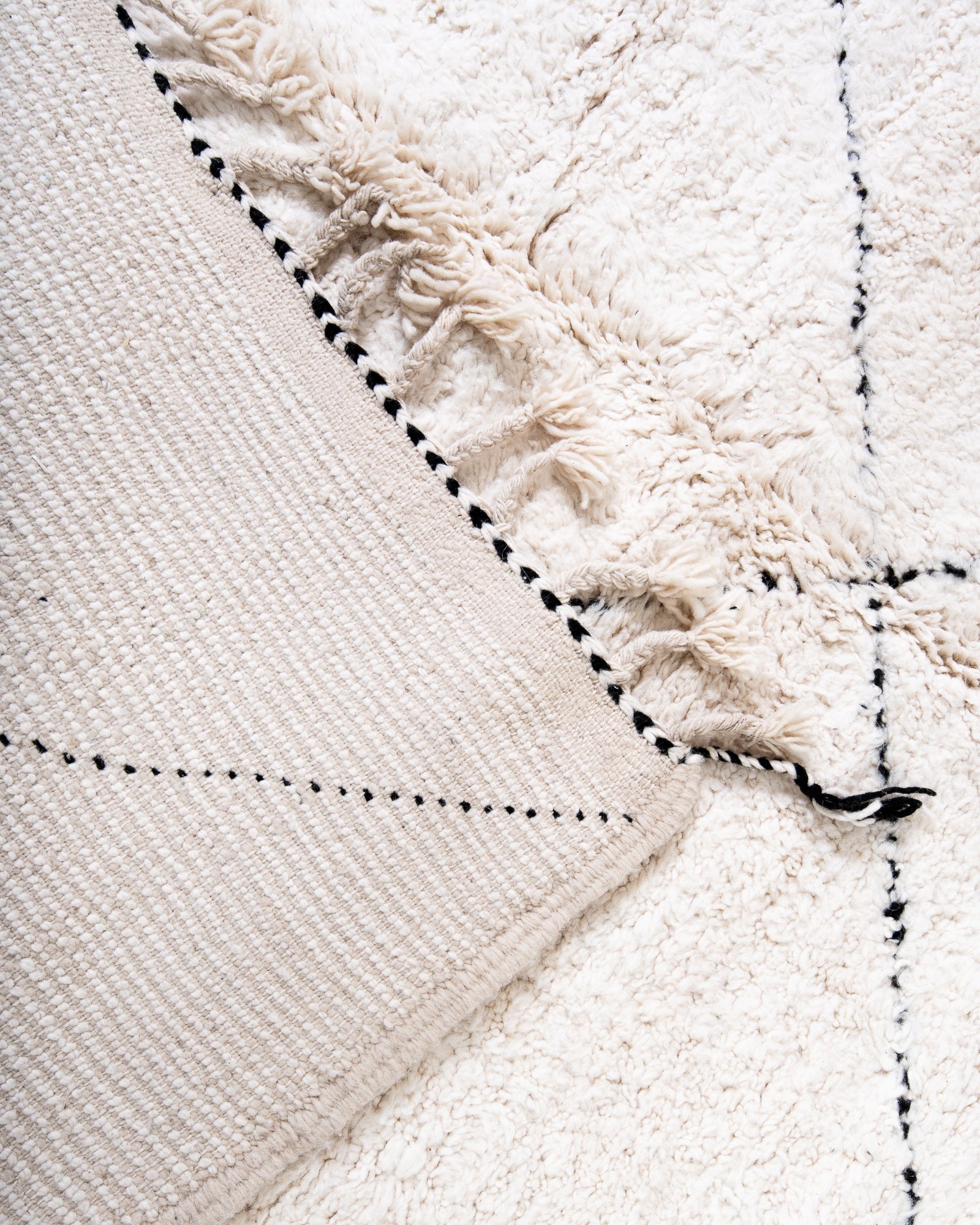 Modern, designer, handcrafted Berber rug from Morocco. Beniourain carpet with beautiful colours and patterns and fluffy wool texture.