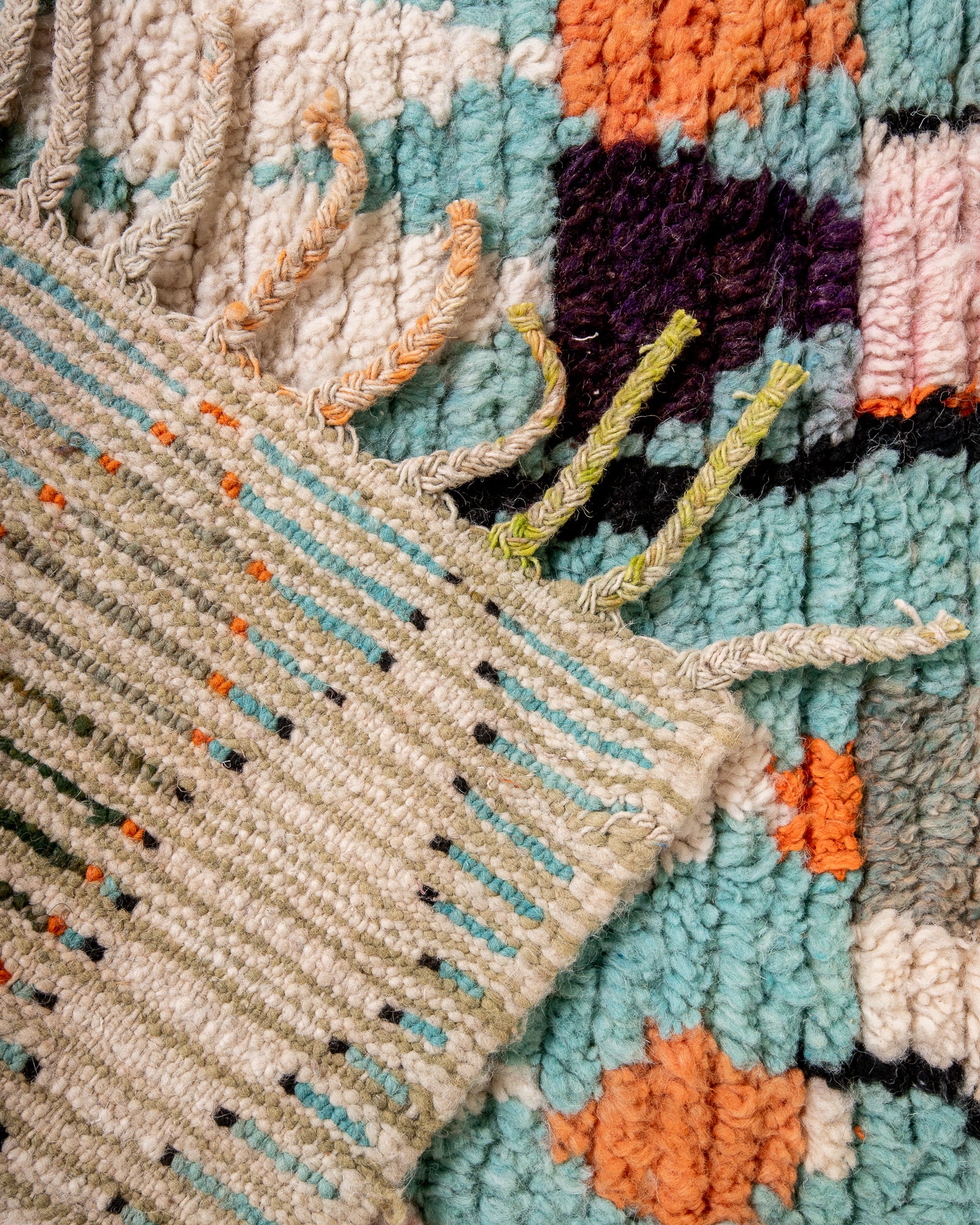 Vintage, handcrafted Berber rug from Morocco. Boucherouite carpet with beautiful colours and patterns and heavy cotton texture.