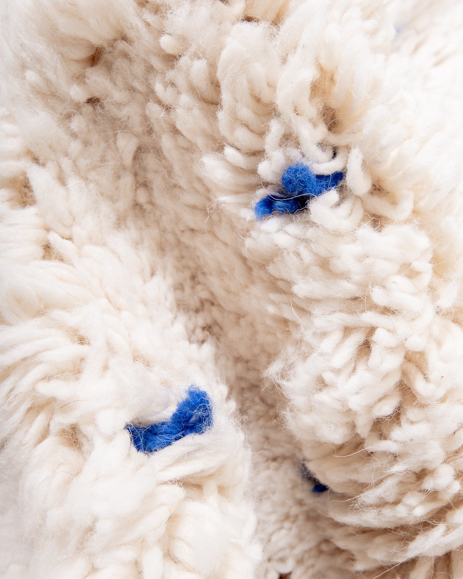 Modern, designer, handcrafted Berber rug from Morocco. Beniourain carpet with beautiful colours and patterns and fluffy wool texture.