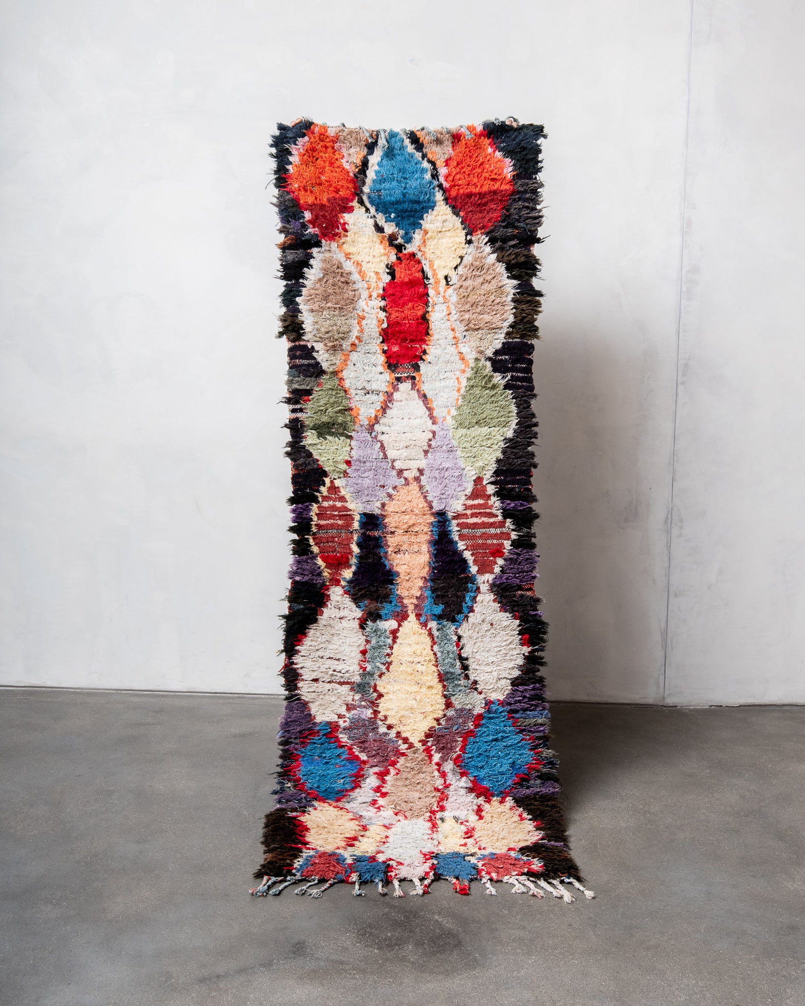 Modern designer vintage handcrafted cotton Berber rug from Morocco. Boucherouite with beautiful colors and patterns.