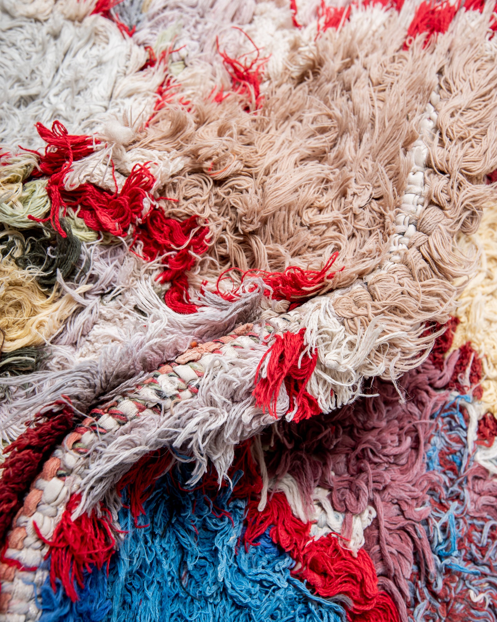 Modern designer vintage handcrafted cotton Berber rug from Morocco. Boucherouite with beautiful colors and patterns.