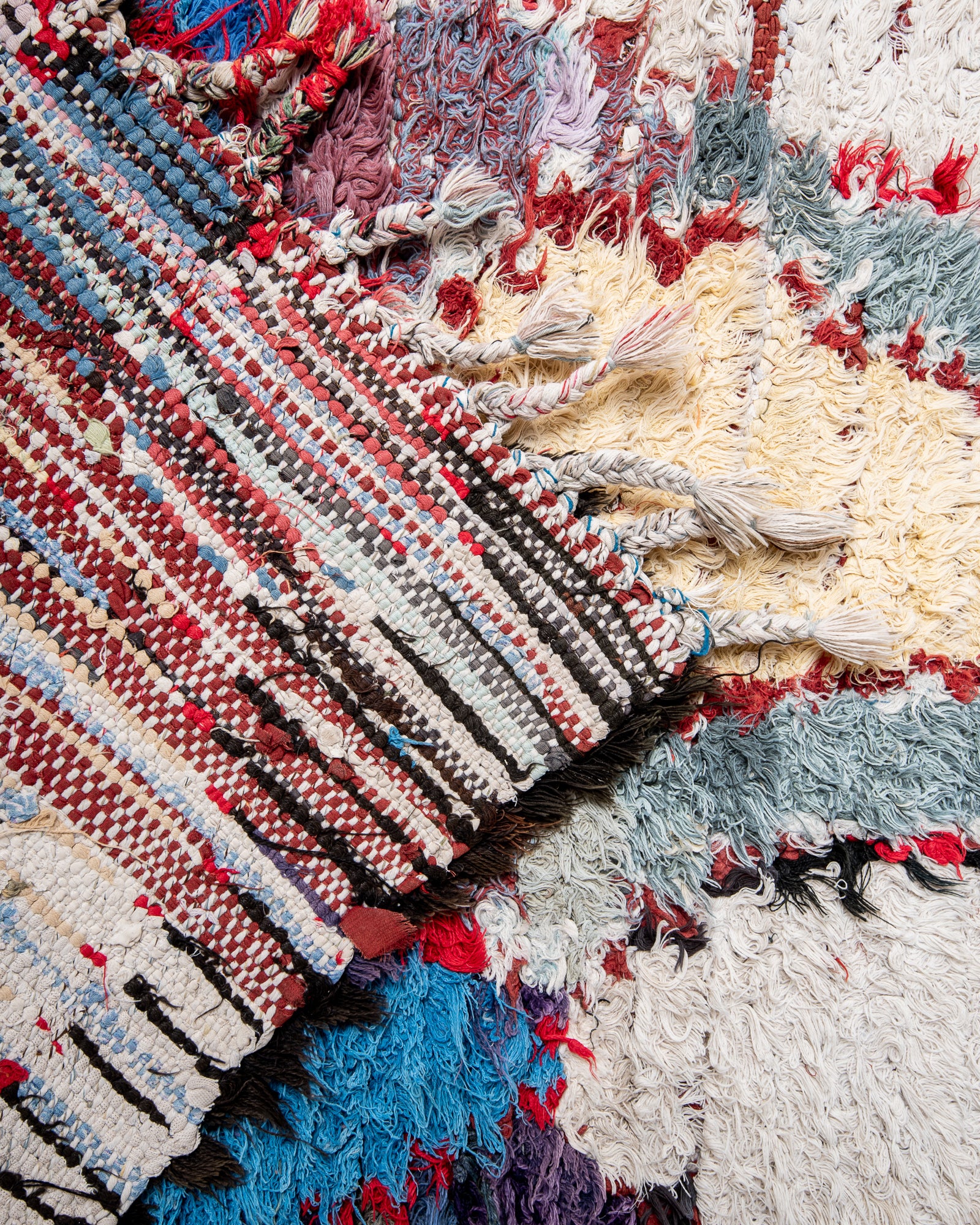 Modern designer vintage handcrafted cotton Berber rug from Morocco. Boucherouite with beautiful colors and patterns.