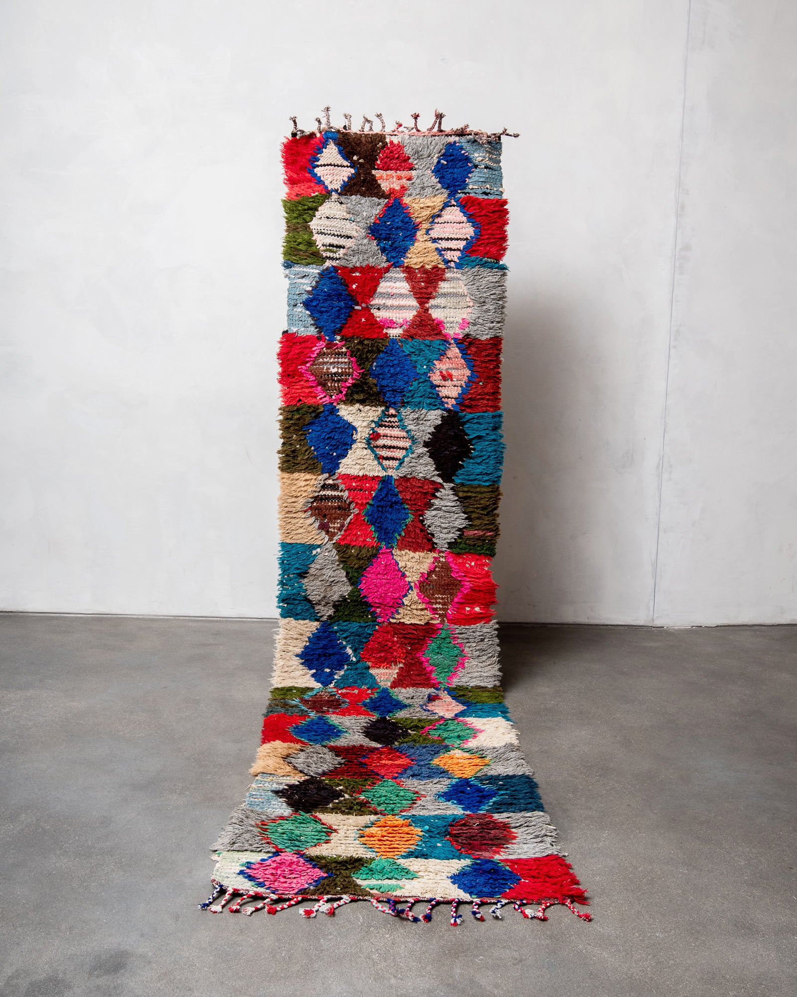 Modern designer vintage handcrafted cotton Berber rug from Morocco. Boucherouite with beautiful colors and patterns.