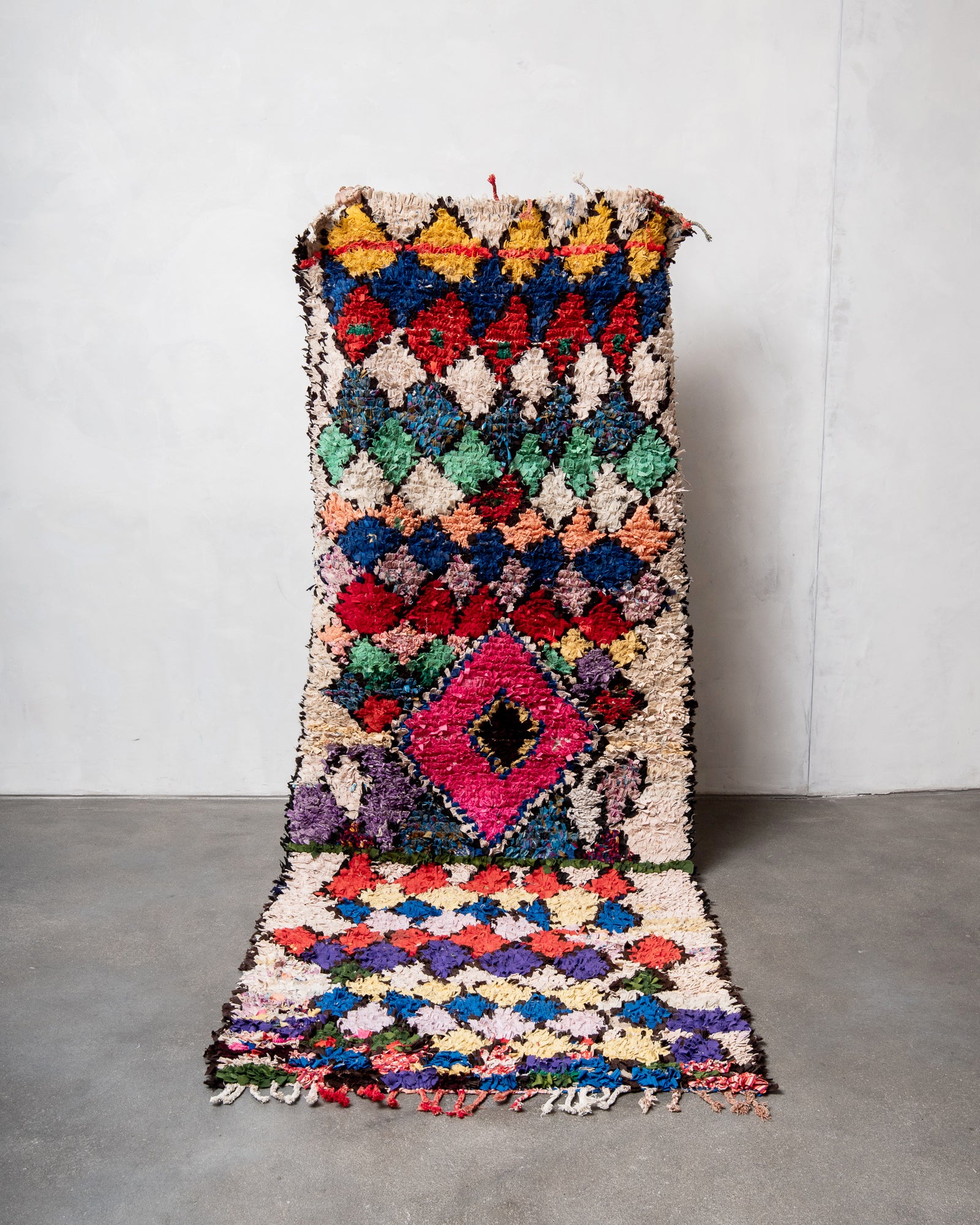 Modern designer vintage handcrafted cotton Berber rug from Morocco. Boucherouite with beautiful colors and patterns.