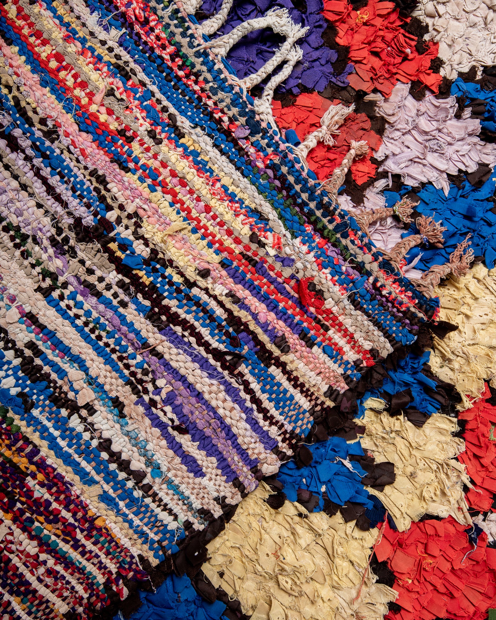 Modern designer vintage handcrafted cotton Berber rug from Morocco. Boucherouite with beautiful colors and patterns.