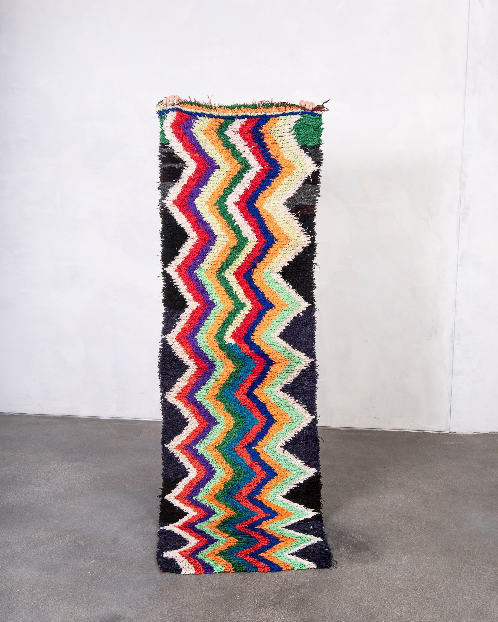 Modern designer vintage handcrafted cotton Berber rug from Morocco. Boucherouite with beautiful colors and patterns.