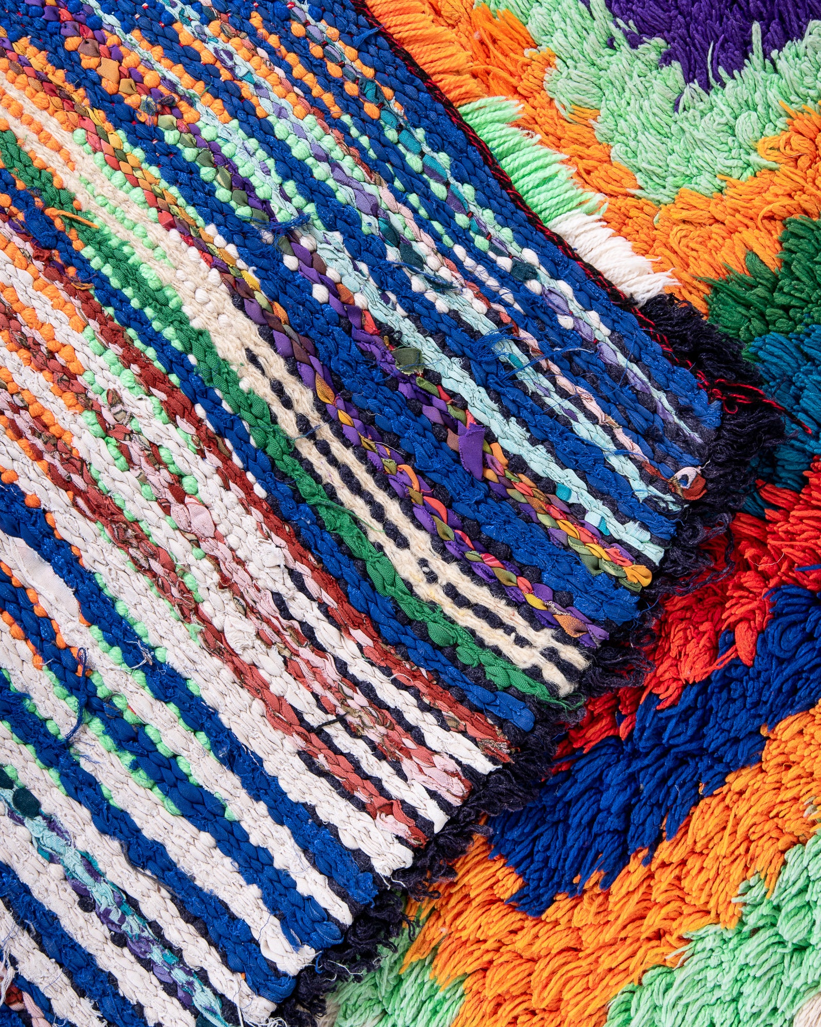 Modern designer vintage handcrafted cotton Berber rug from Morocco. Boucherouite with beautiful colors and patterns.