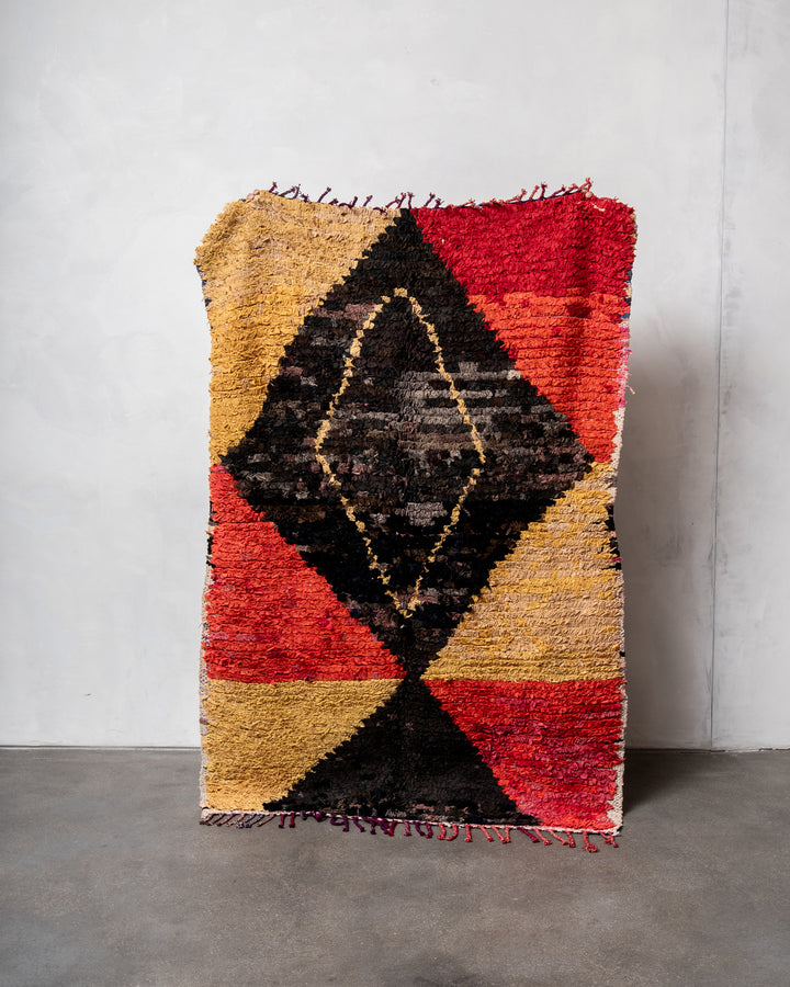 Modern designer vintage handcrafted cotton Berber rug from Morocco. Boucherouite with beautiful colors and patterns.