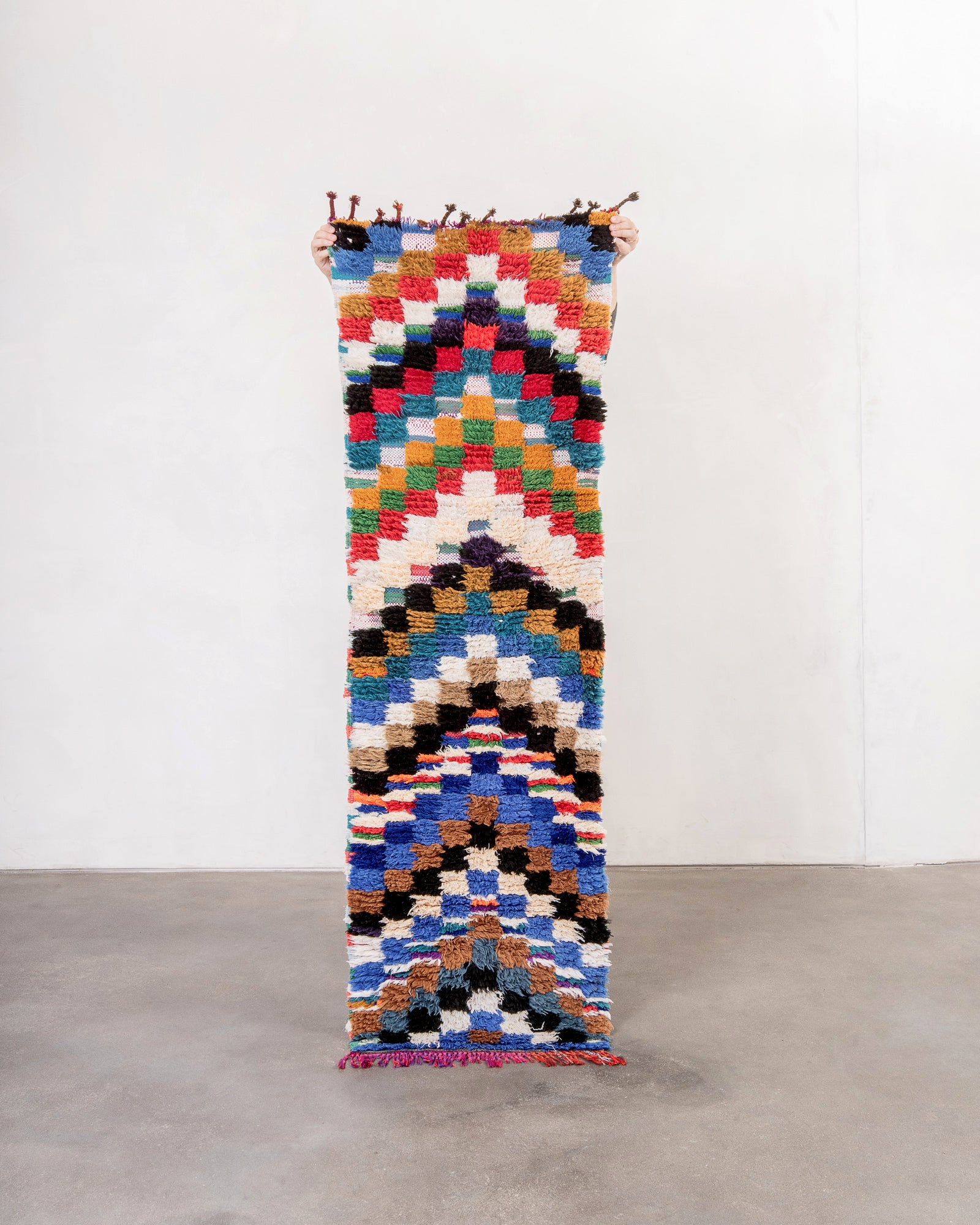 Modern designer handcrafted cotton Berber rug from Morocco. Boucherouite with beautiful colors and patterns.