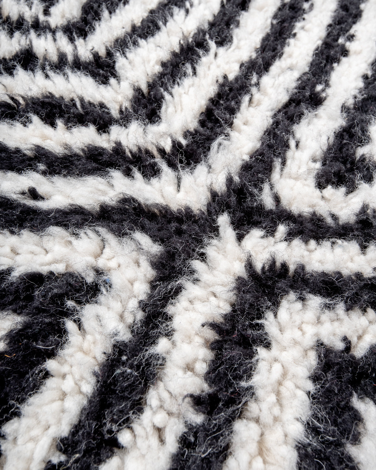 Modern, designer, handcrafted Berber runner rug from Morocco. Beniourain carpet with beautiful colours and patterns and fluffy wool texture.