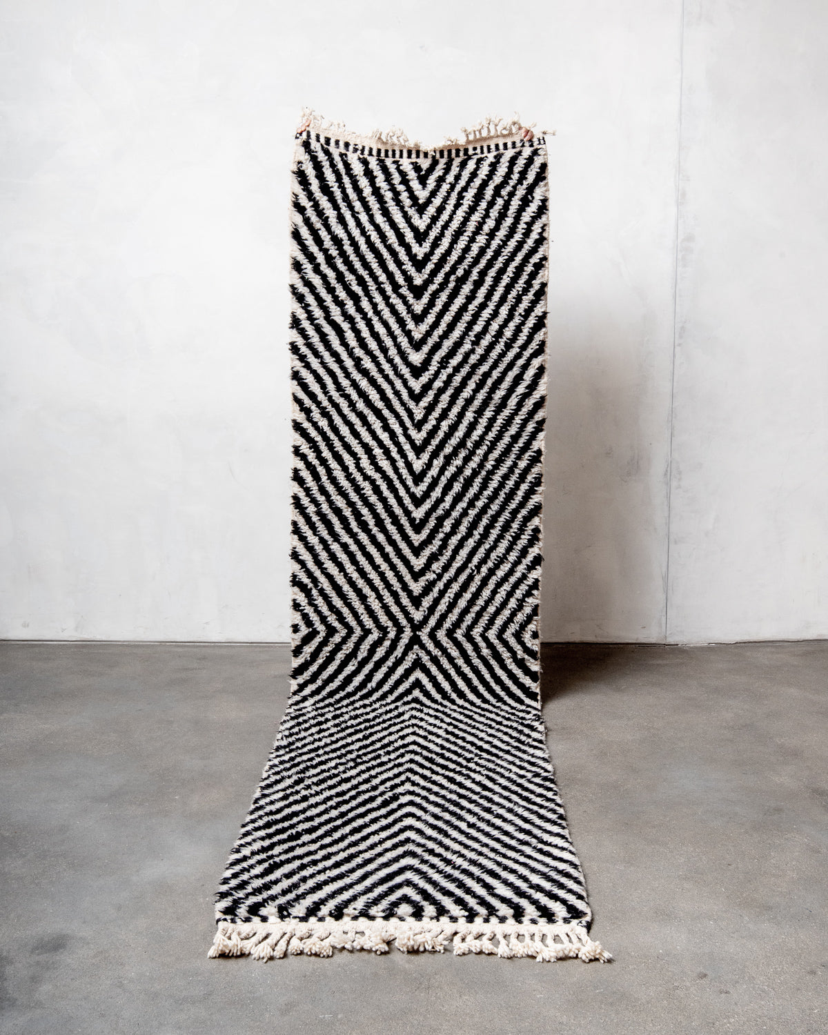 Modern, designer, handcrafted Berber runner rug from Morocco. Beniourain carpet with beautiful colours and patterns and fluffy wool texture.