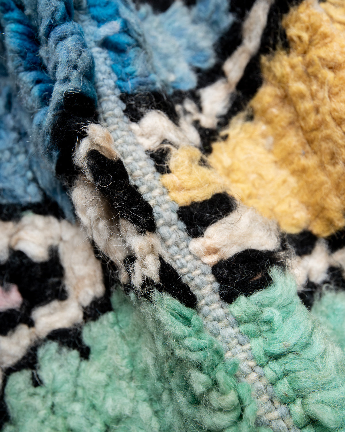 Modern designer handcrafted Berber rug from Morocco. Boujed with beautiful colours and patterns.