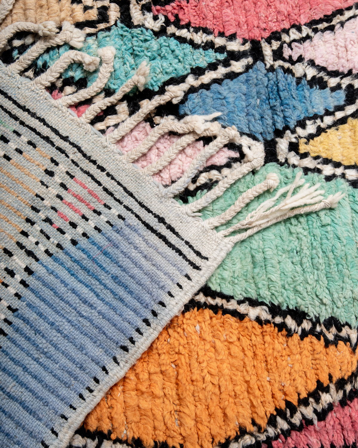 Modern designer handcrafted Berber rug from Morocco. Boujed with beautiful colours and patterns.