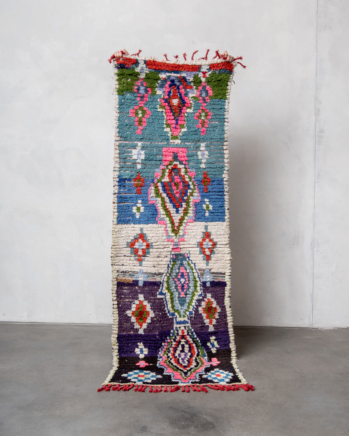 Modern designer vintage handcrafted Berber rug from Morocco. Boucherouite with beautiful colors and patterns.
