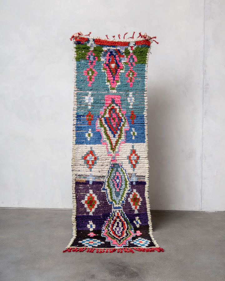 Modern designer vintage handcrafted Berber rug from Morocco. Boucherouite with beautiful colors and patterns.