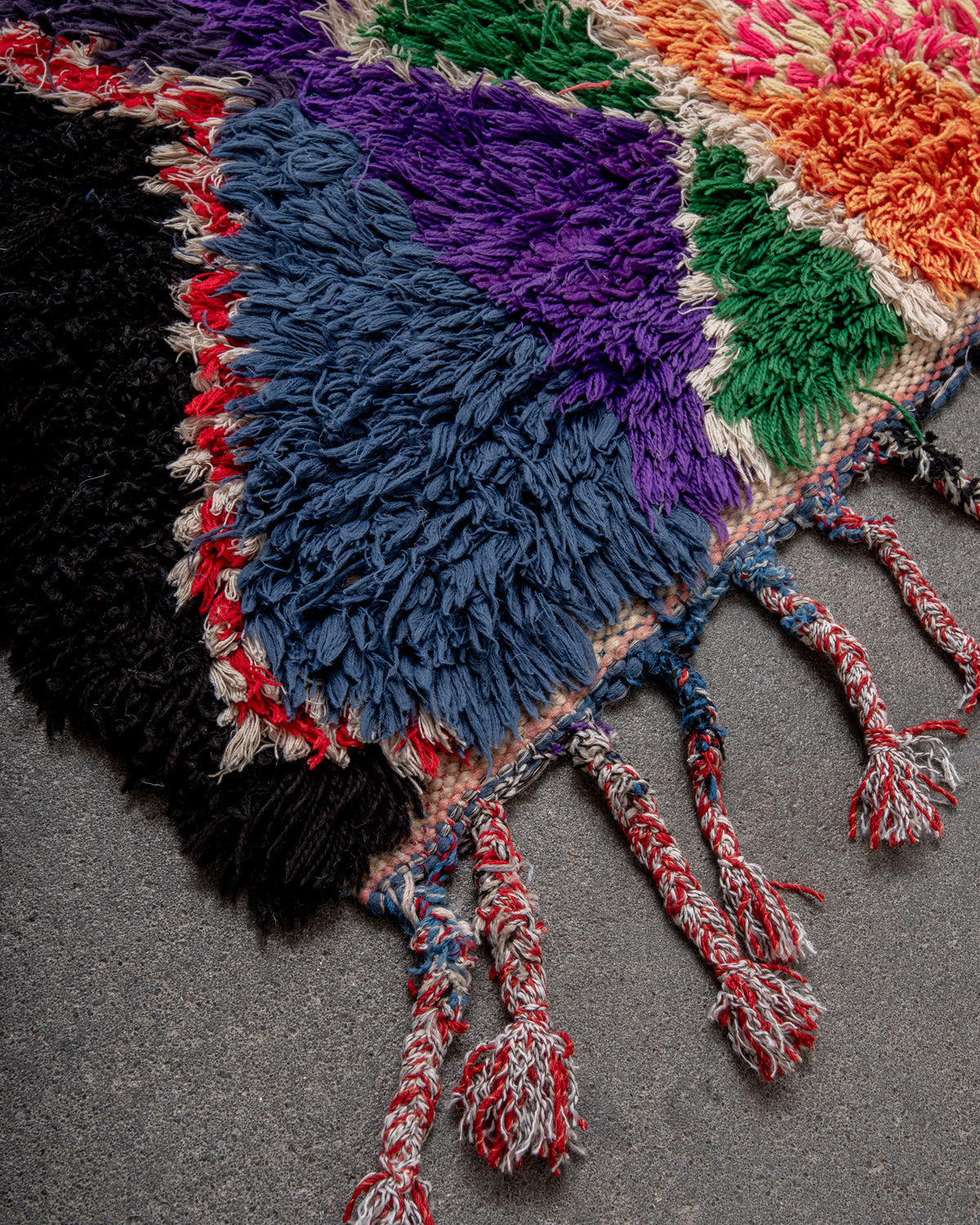 Modern designer vintage handcrafted Berber rug from Morocco. Boucherouite with beautiful colors and patterns.