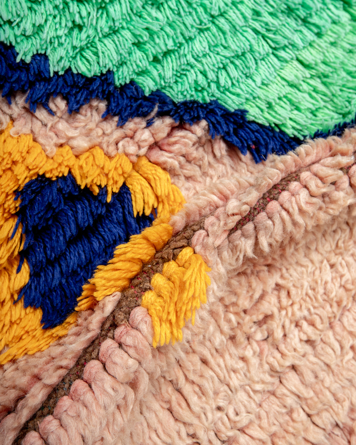 Modern designer vintage handcrafted Berber rug from Morocco. Boucherouite with beautiful colors and patterns.