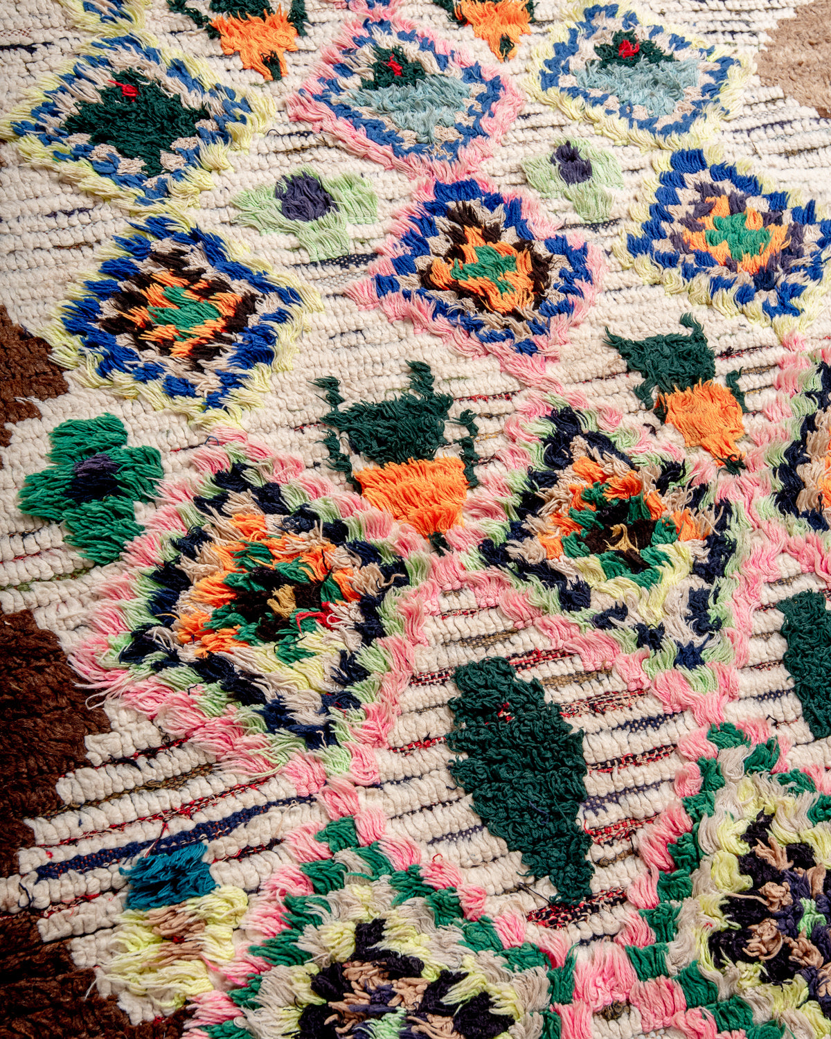 Modern designer vintage handcrafted Berber rug from Morocco. Boucherouite with beautiful colors and patterns.