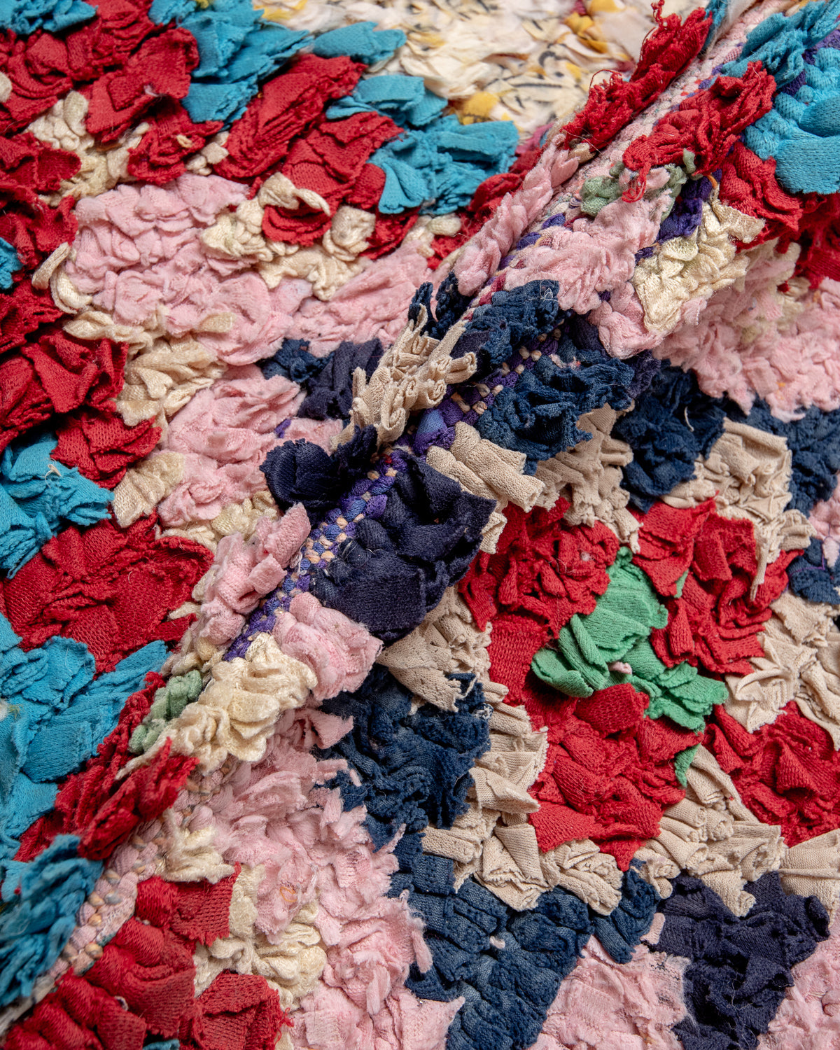 Modern designer vintage handcrafted Berber rug from Morocco. Boucherouite with beautiful colors and patterns.