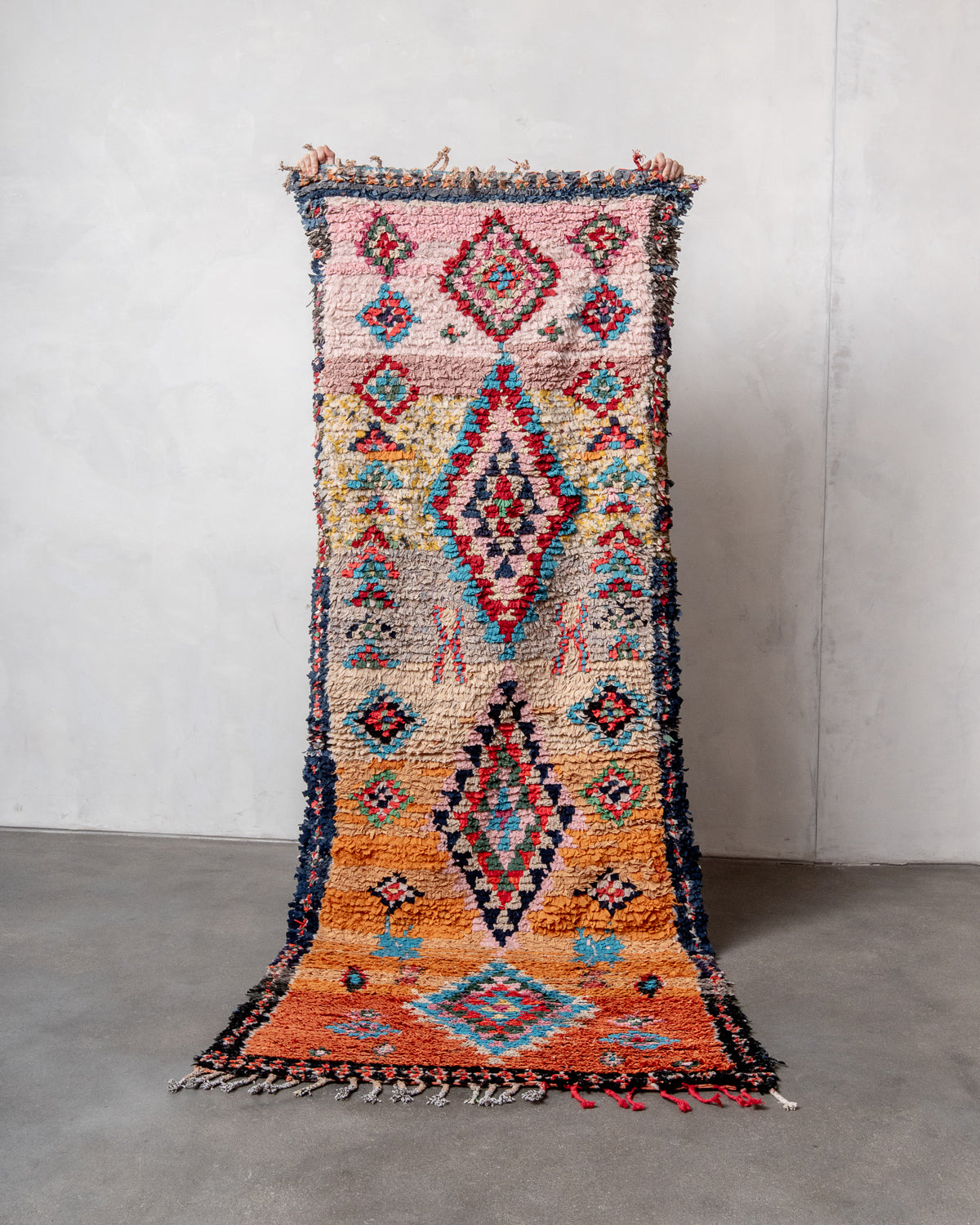 Modern designer vintage handcrafted Berber rug from Morocco. Boucherouite with beautiful colors and patterns.