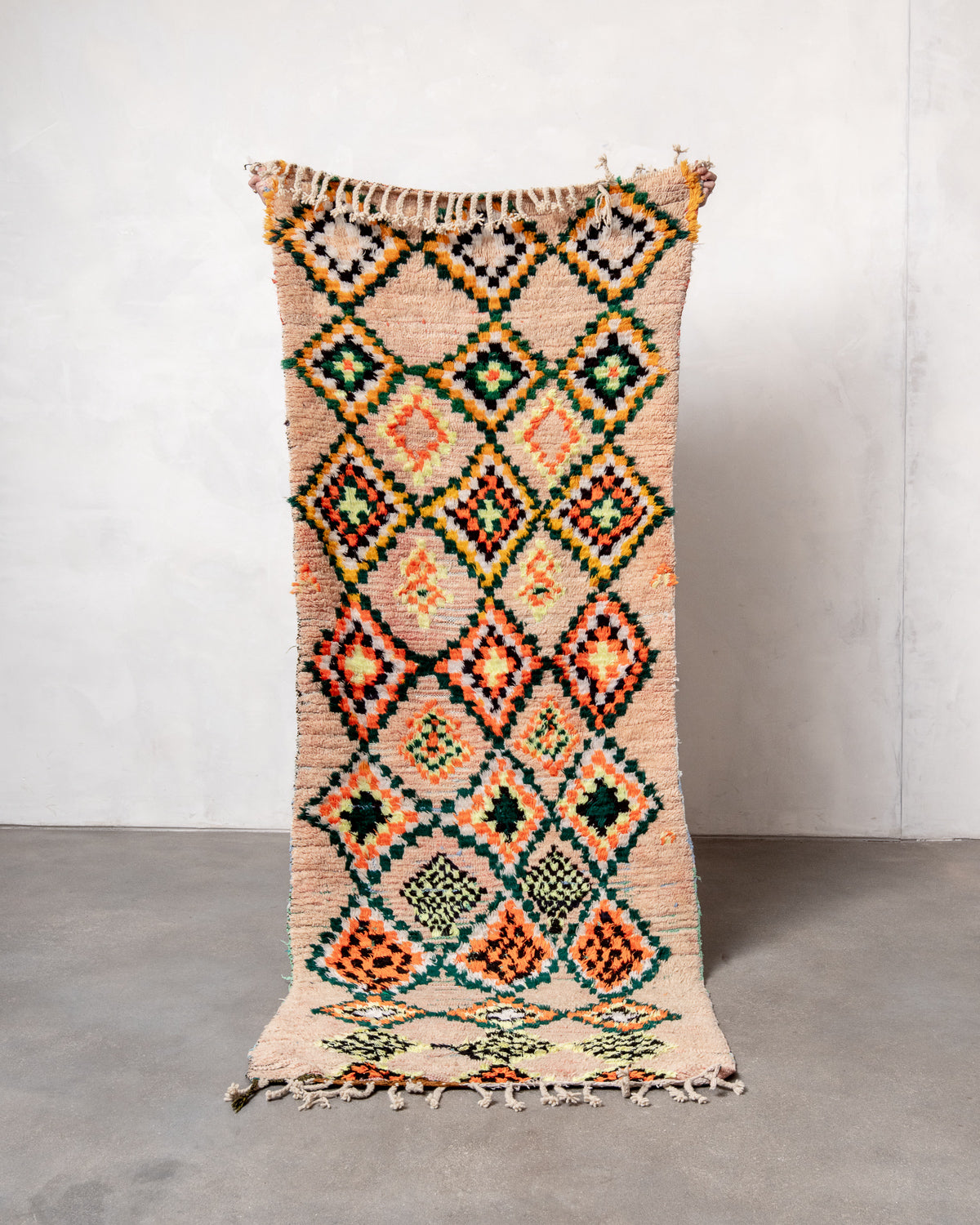 Modern designer vintage handcrafted Berber rug from Morocco. Boucherouite runner rug with beautiful colors and patterns.