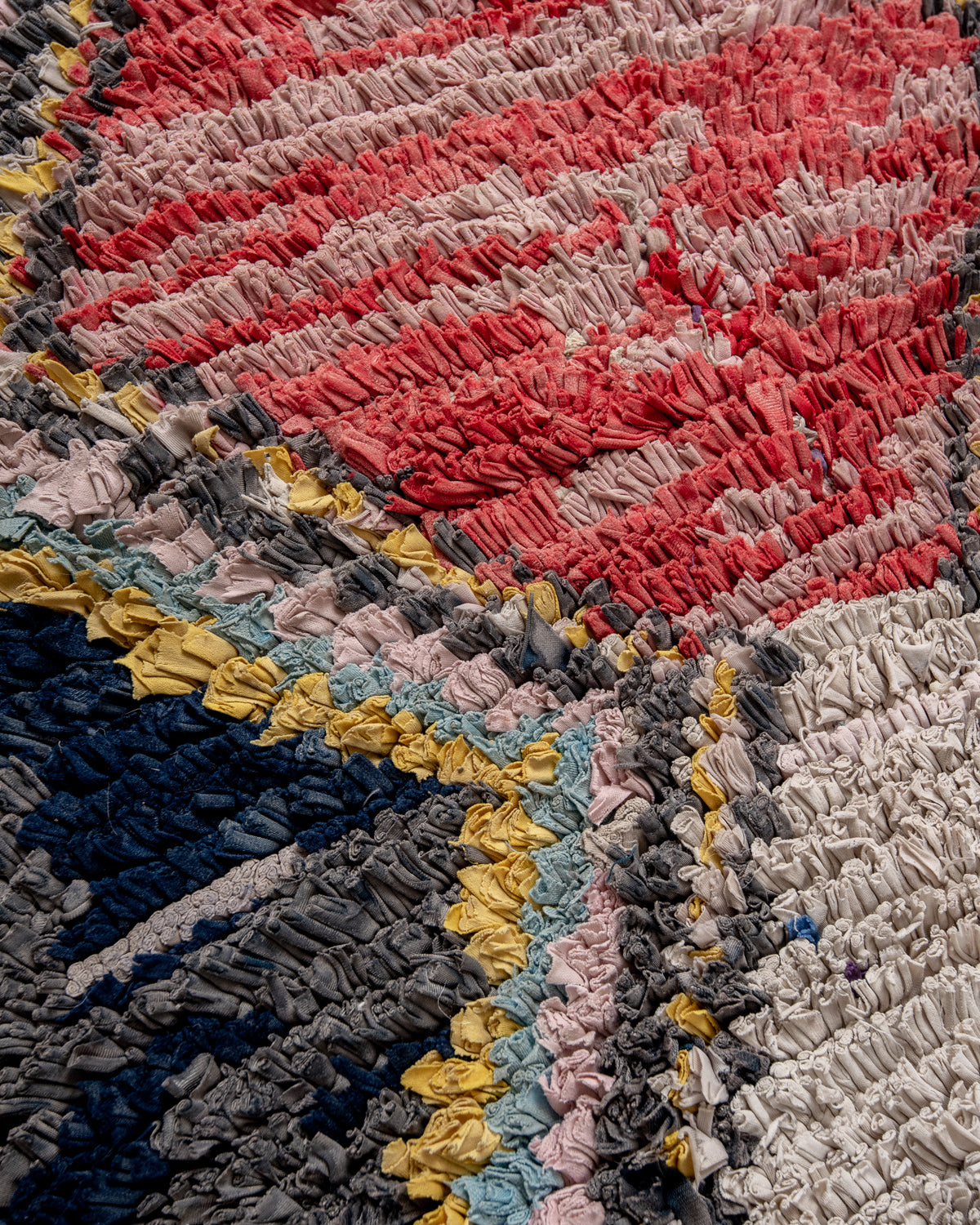 Modern designer vintage handcrafted Berber rug from Morocco. Boucherouite runner rug with beautiful colors and patterns.