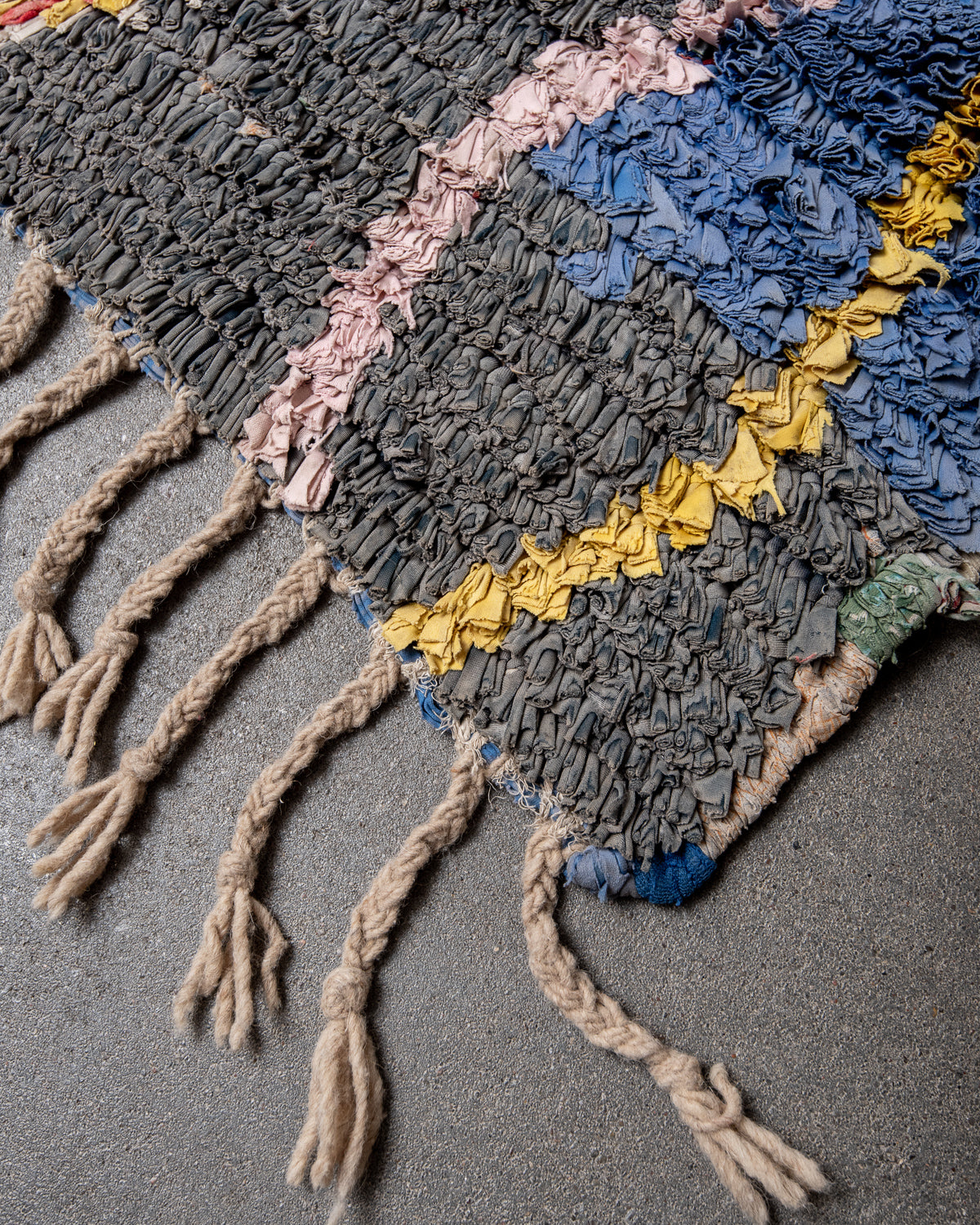 Modern designer vintage handcrafted Berber rug from Morocco. Boucherouite runner rug with beautiful colors and patterns.