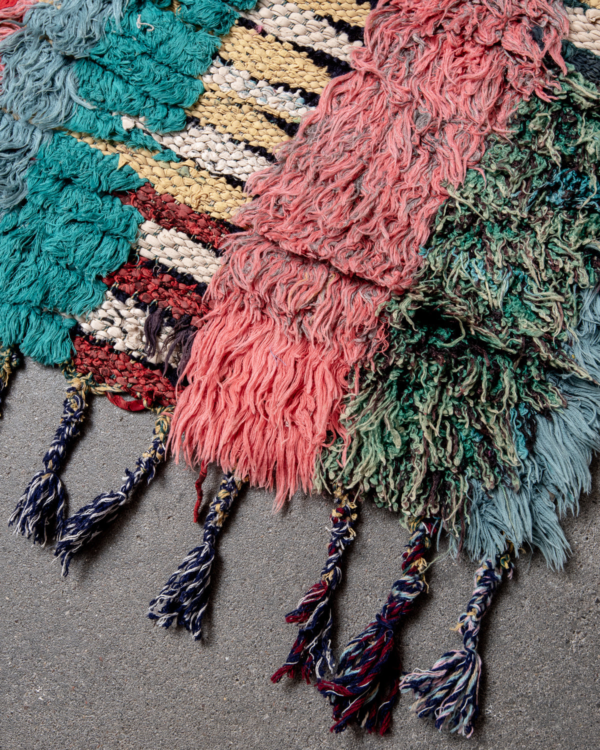 Modern designer vintage handcrafted Berber rug from Morocco. Boucherouite runner rug with beautiful colors and patterns.