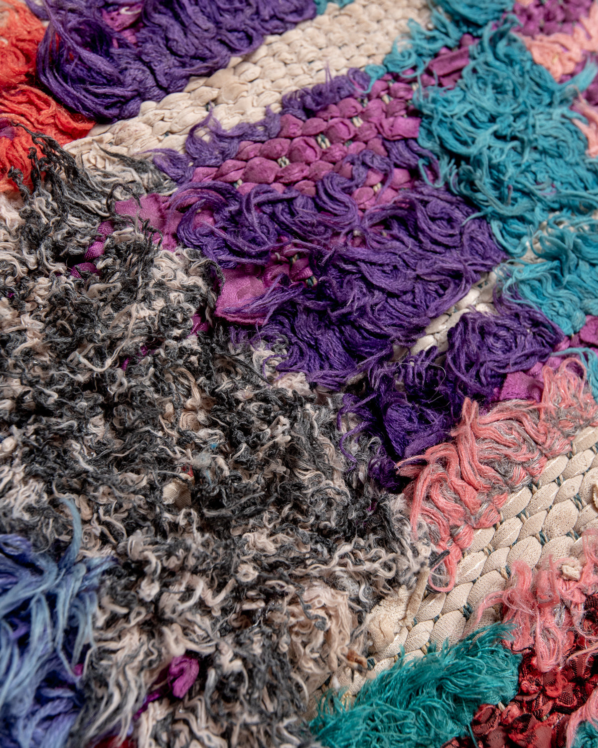 Modern designer vintage handcrafted Berber rug from Morocco. Boucherouite runner rug with beautiful colors and patterns.