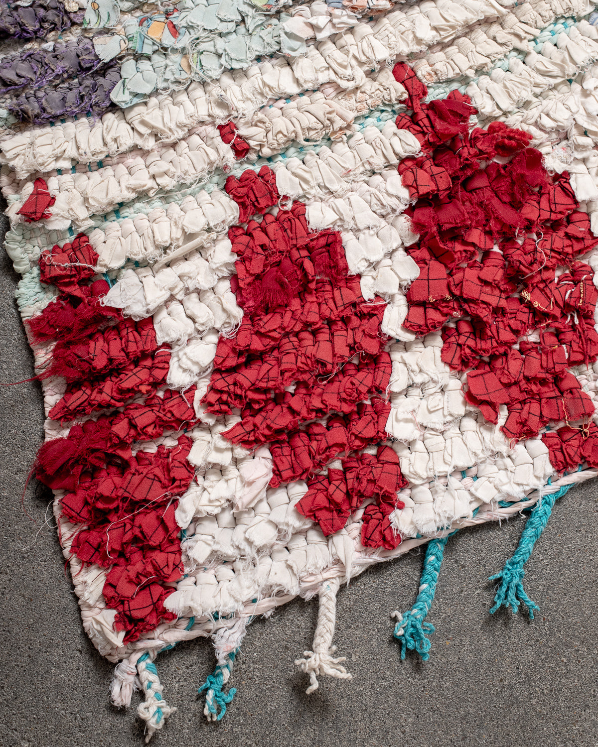 Modern designer vintage handcrafted Berber rug from Morocco. Boucherouite runner rug with beautiful colors and patterns.