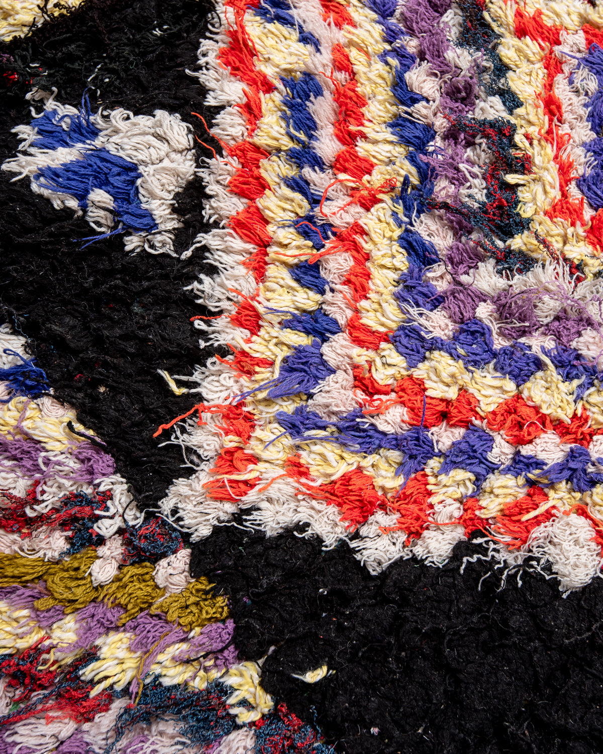 Modern designer vintage handcrafted Berber rug from Morocco. Boucherouite runner rug with beautiful colors and patterns.