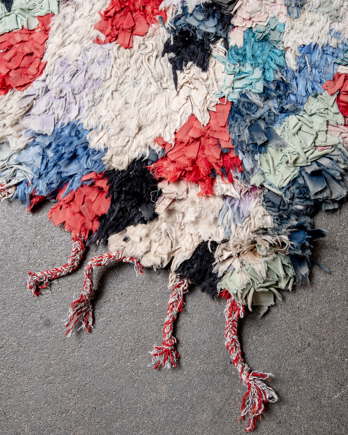 Modern designer vintage handcrafted Berber rug from Morocco. Boucherouite runner rug with beautiful colors and patterns.