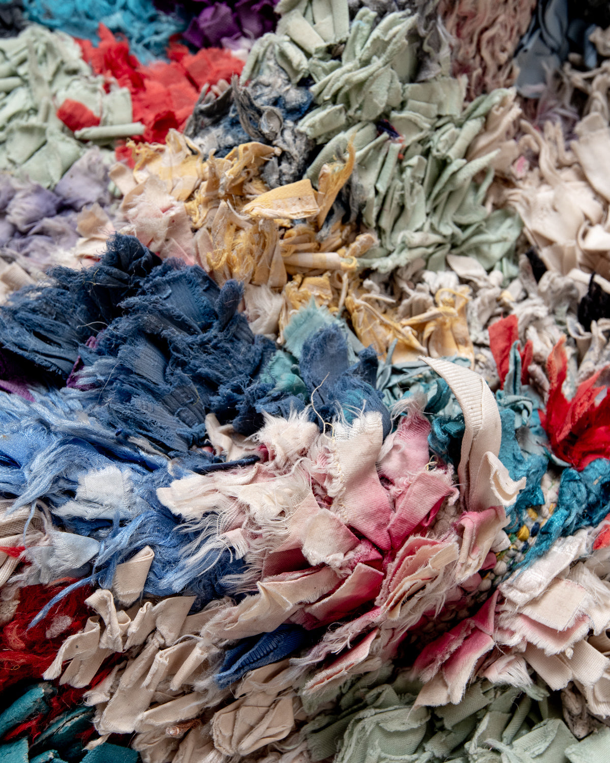 Modern designer vintage handcrafted Berber rug from Morocco. Boucherouite runner rug with beautiful colors and patterns.