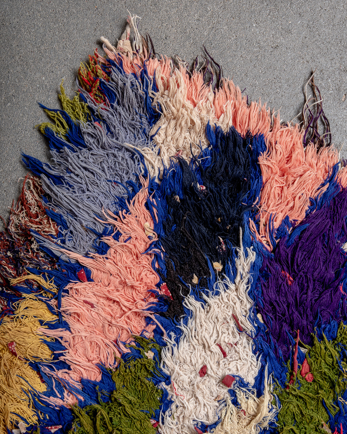 Modern designer vintage handcrafted Berber rug from Morocco. Boucherouite with beautiful colors and patterns.