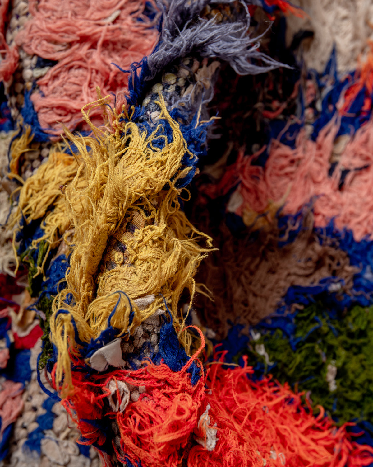 Modern designer vintage handcrafted Berber rug from Morocco. Boucherouite with beautiful colors and patterns.