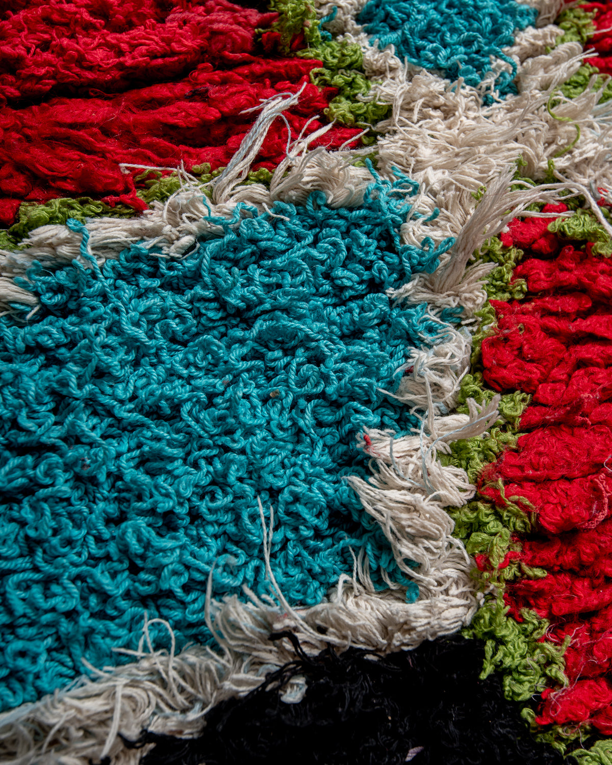 Modern designer vintage handcrafted Berber rug from Morocco. Boucherouite with beautiful colors and patterns.