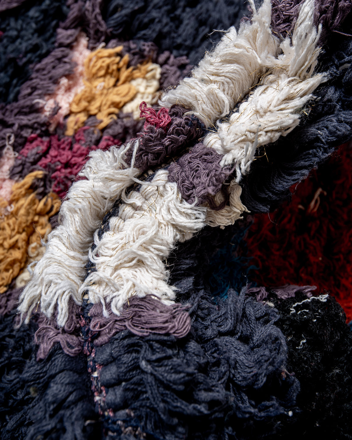 Modern designer vintage handcrafted Berber rug from Morocco. Boucherouite with beautiful colors and patterns.