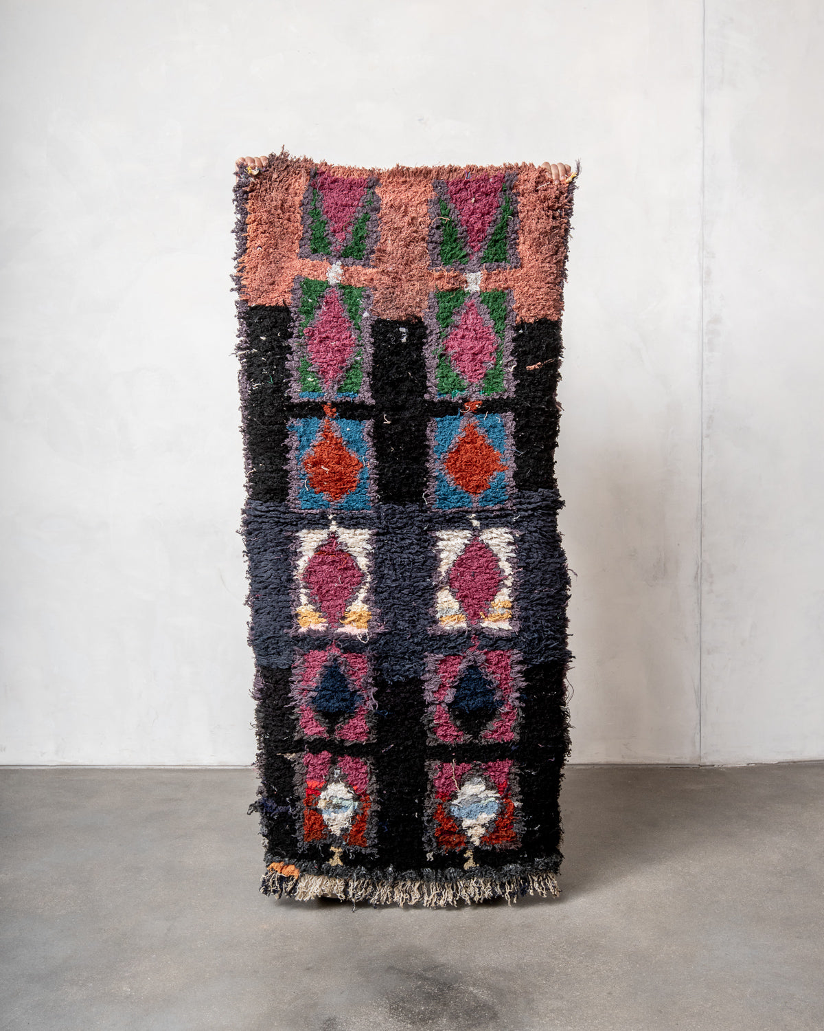 Modern designer vintage handcrafted Berber rug from Morocco. Boucherouite with beautiful colors and patterns.