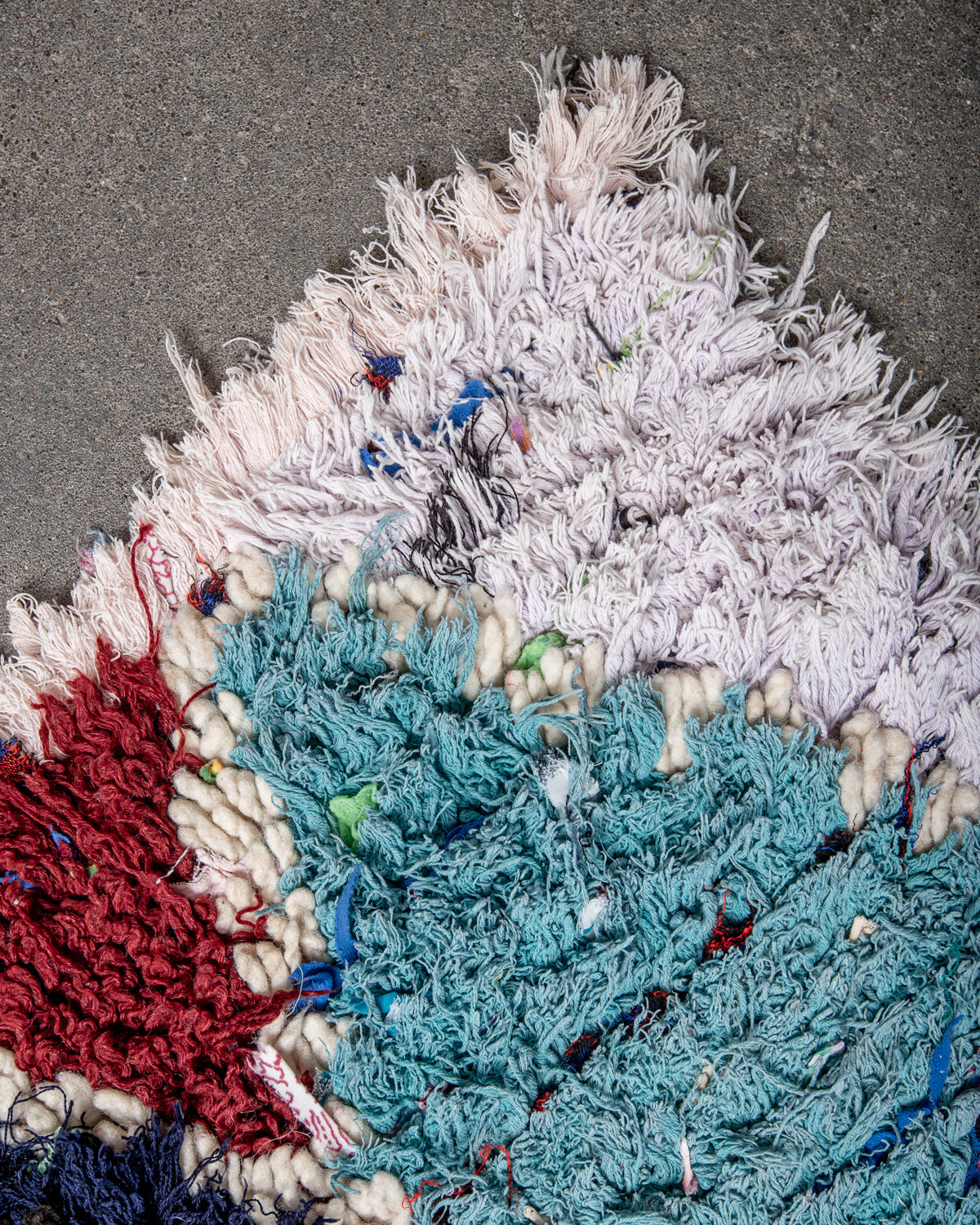 Modern designer vintage handcrafted Berber rug from Morocco. Boucherouite runner rug with beautiful colors and patterns.