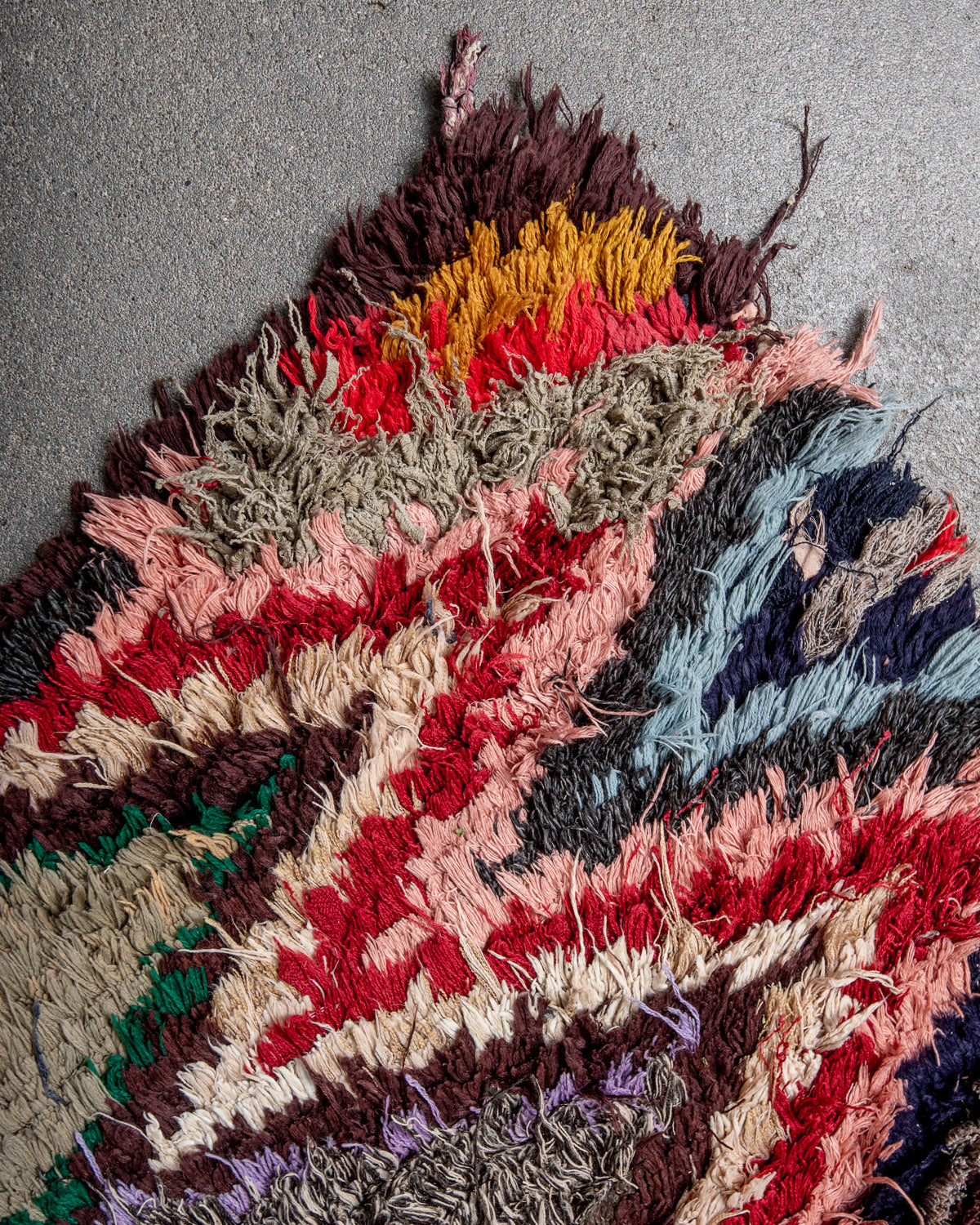 Modern designer vintage handcrafted Berber rug from Morocco. Boucherouite runner rug with beautiful colors and patterns.