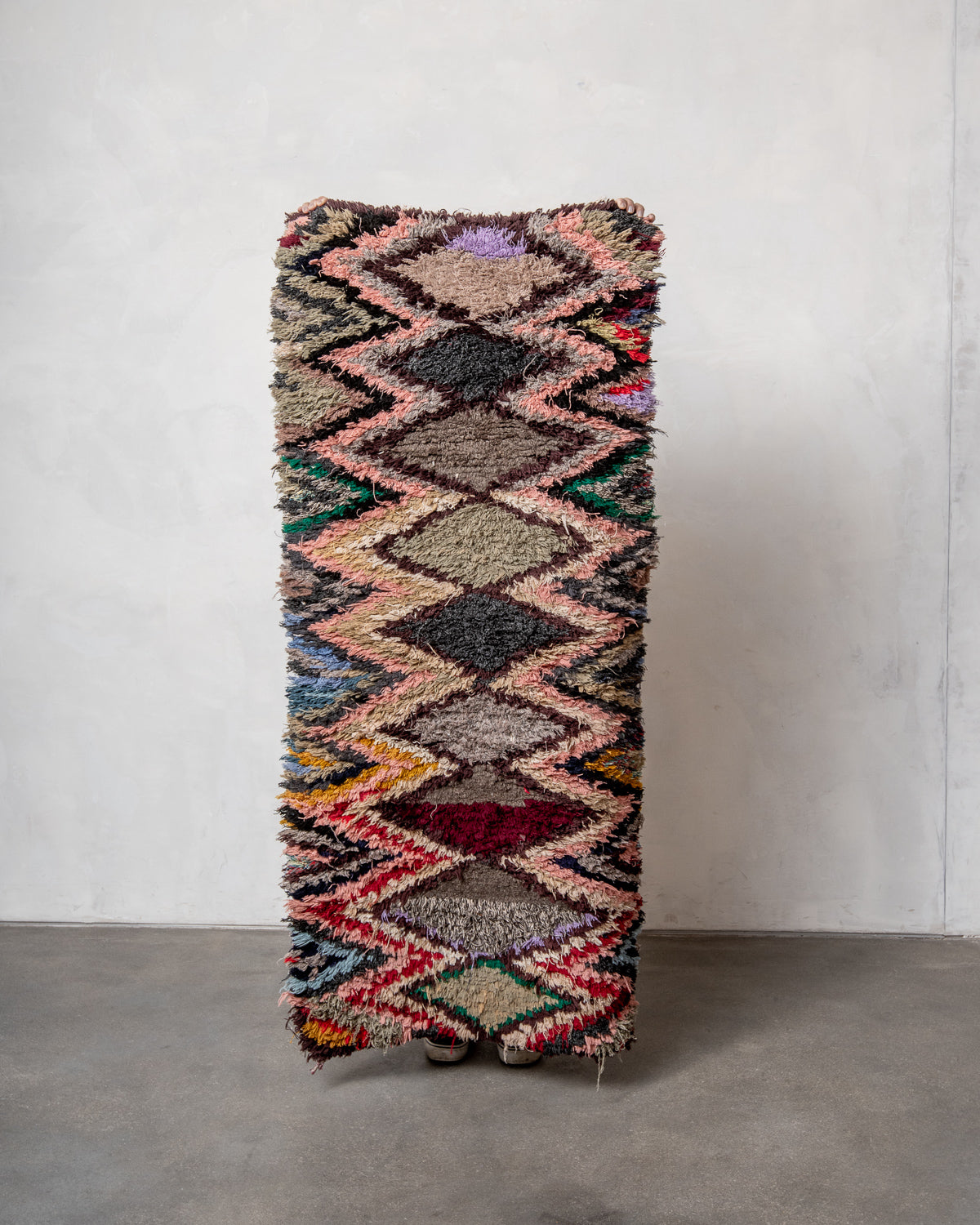 Modern designer vintage handcrafted Berber rug from Morocco. Boucherouite runner rug with beautiful colors and patterns.